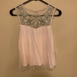 Beautiful tank top with see through chest